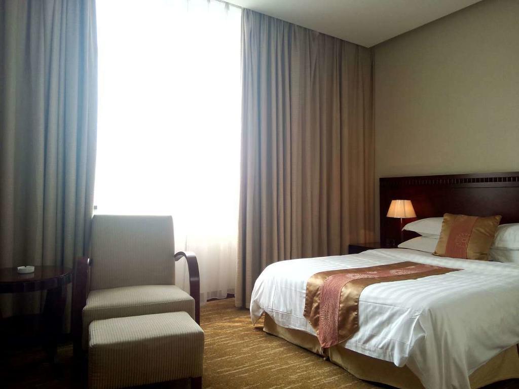Century Hotel Taicang Rom bilde