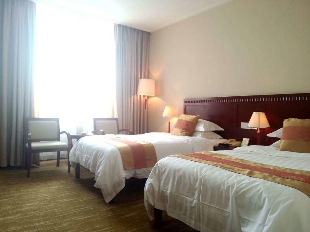 Century Hotel Taicang Rom bilde